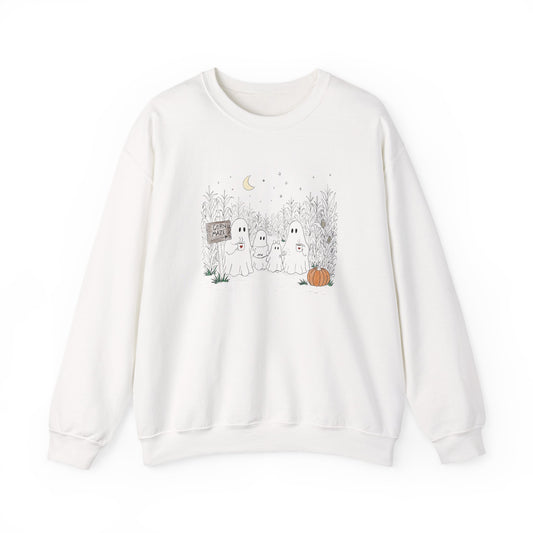 Crewneck sweatshirt featuring a hand-drawn ghost family walking through a moonlit corn maze with warm drinks, tall corn stalks, and a pumpkin from The Story of the Ghost Chapter 2 collection.