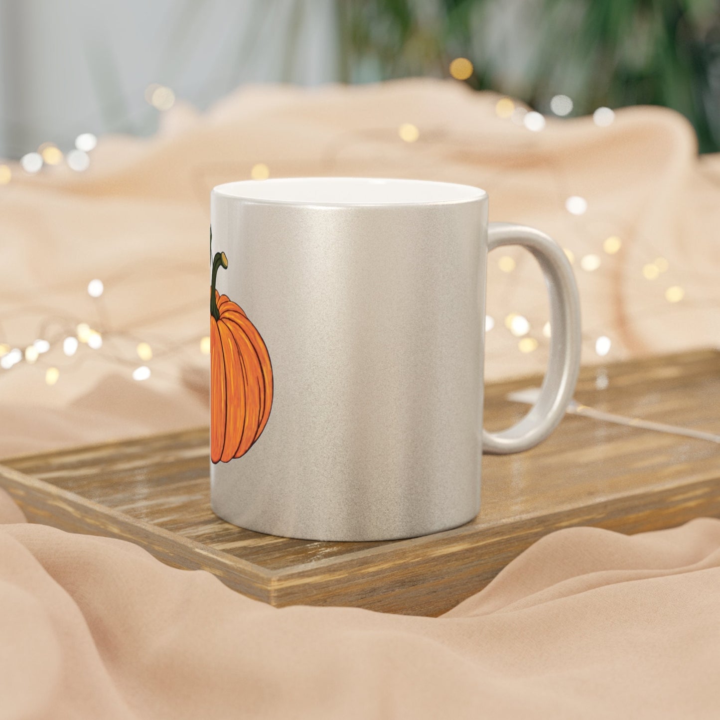 Metallic orange pumpkin design on ceramic mug; festive fall drinkware