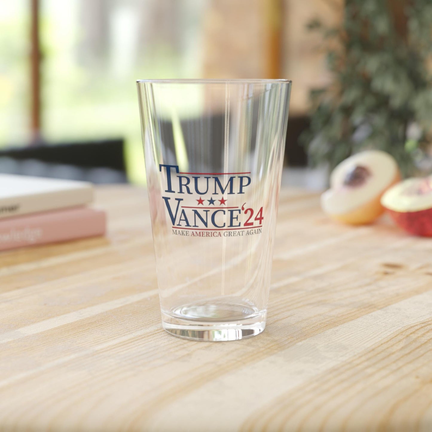 Trump Vance 2024 campaign logo in red, white, and blue on 16oz pint glass; hand wash only