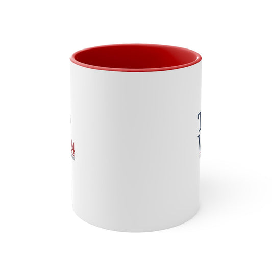 A white ceramic coffee mug with a bold red interior and handle, featuring the Trump Vance 2024 campaign logo.