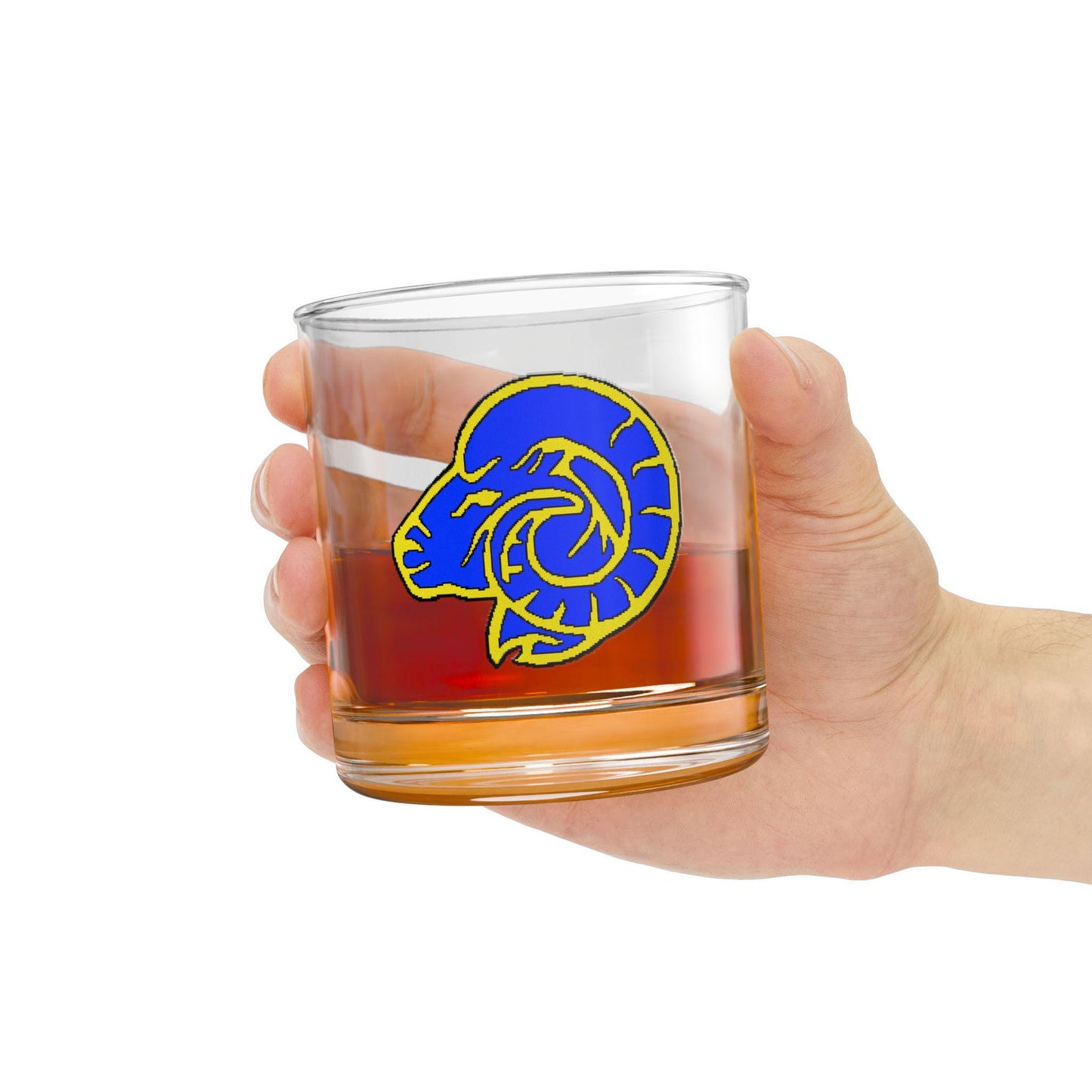 A clear tempered glass rocks glass with a hand-drawn LA Rams logo in gold and blue colors.