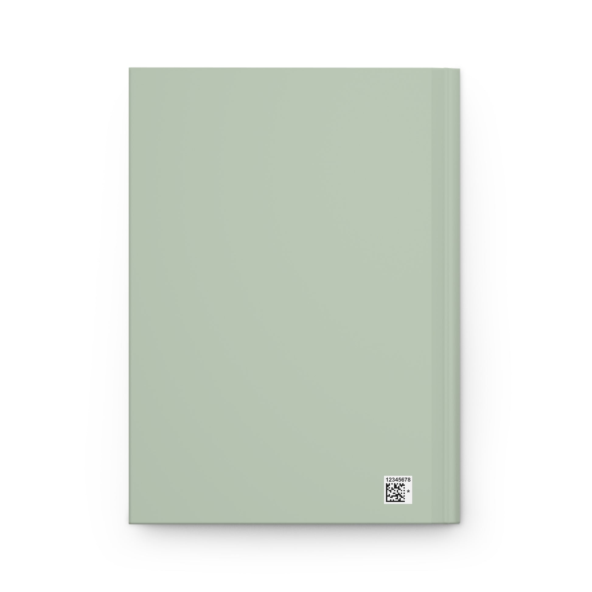 A minimalist hardcover notebook in a muted sage green color, shown closed against a clean white background with a small square logo sticker in the bottom right corner.