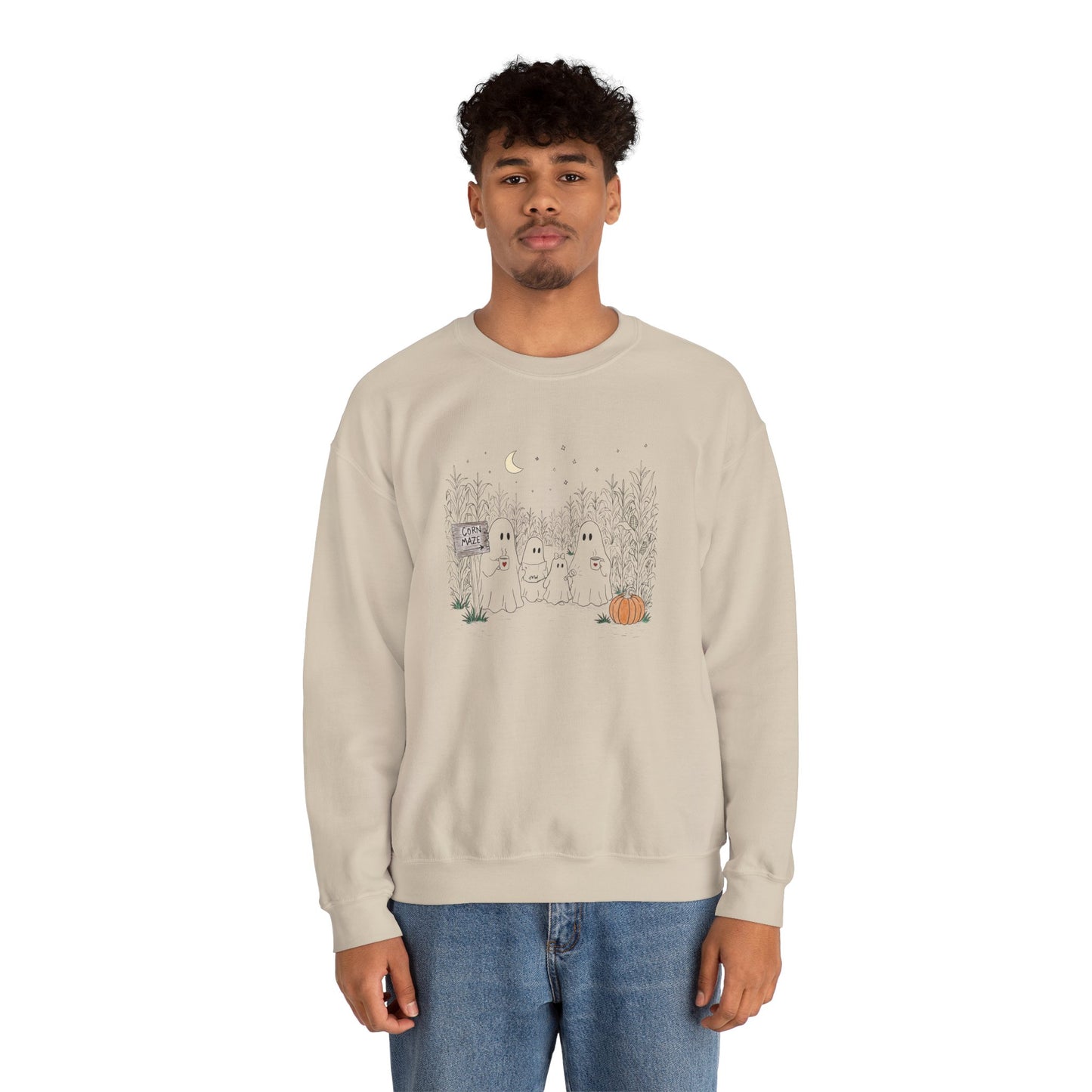 Crewneck sweatshirt featuring a hand-drawn ghost family walking through a moonlit corn maze with warm drinks, tall corn stalks, and a pumpkin from The Story of the Ghost Chapter 2 collection.