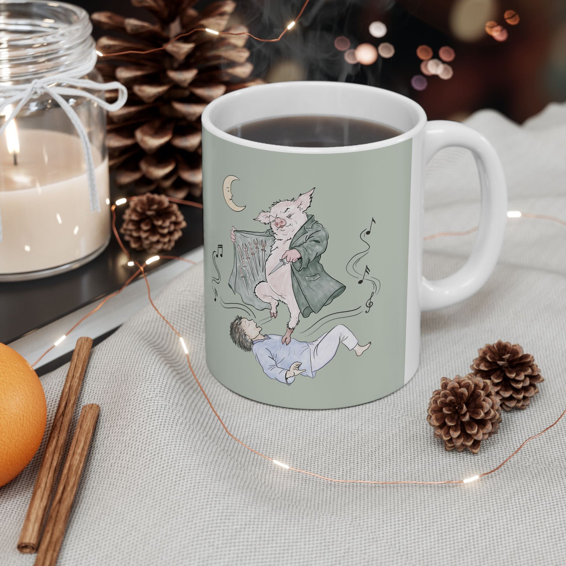 Sage green ceramic mug featuring original hand-drawn Guyute-inspired artwork with a surreal pig, musical mist, moon, and hidden song details.