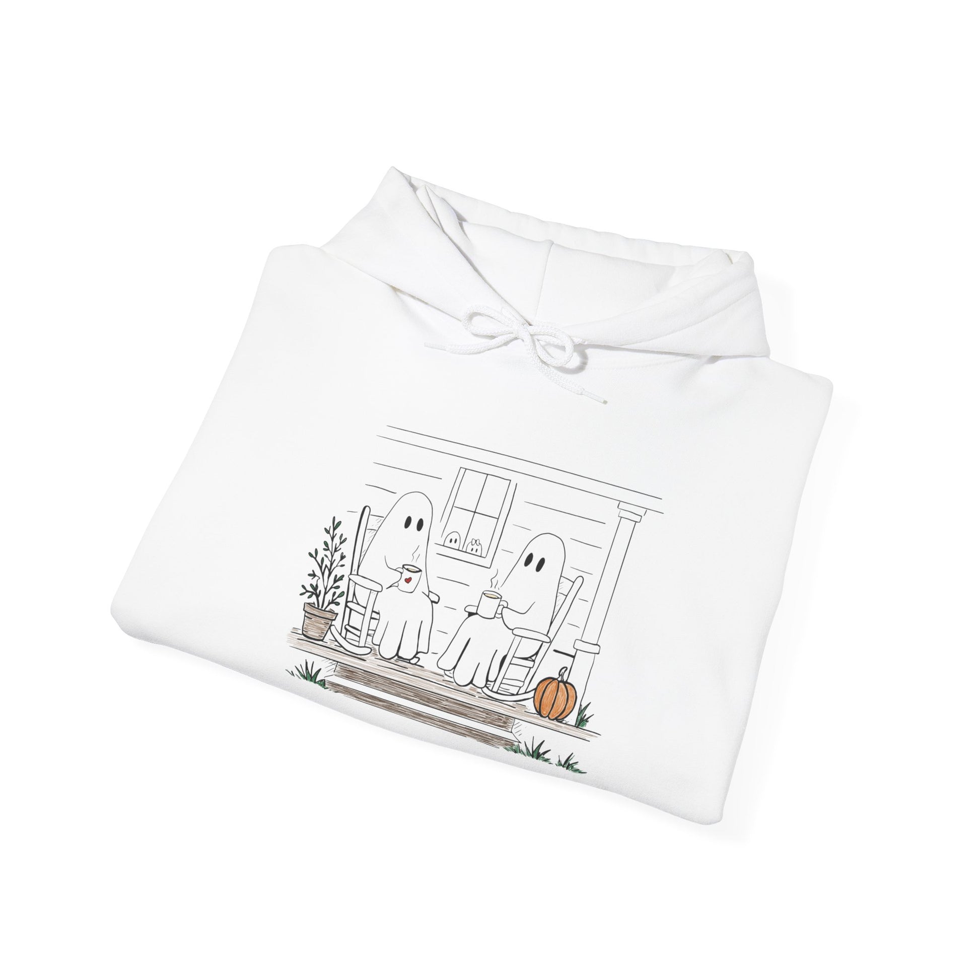Pullover hoodie featuring a hand-drawn ghost family enjoying coffee in rocking chairs on a front porch, with two little ghosts peeking through the window, a pumpkin, and subtle fall color accents.