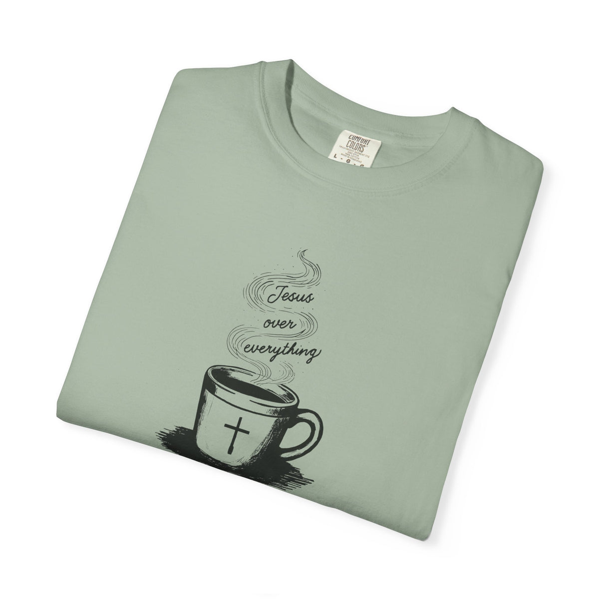 Sage Comfort Colors Christian T-shirt featuring original Daily Cup of JOE Jesus Over Everything coffee cup artwork inspired by Colossians 1:18.