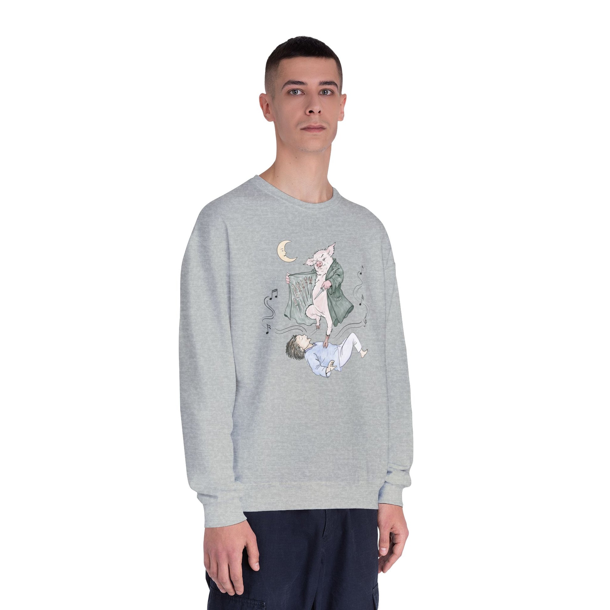 Crewneck sweatshirt featuring original hand-drawn Guyute-inspired artwork with a surreal pig, moon, musical mist, and muted storybook colors.