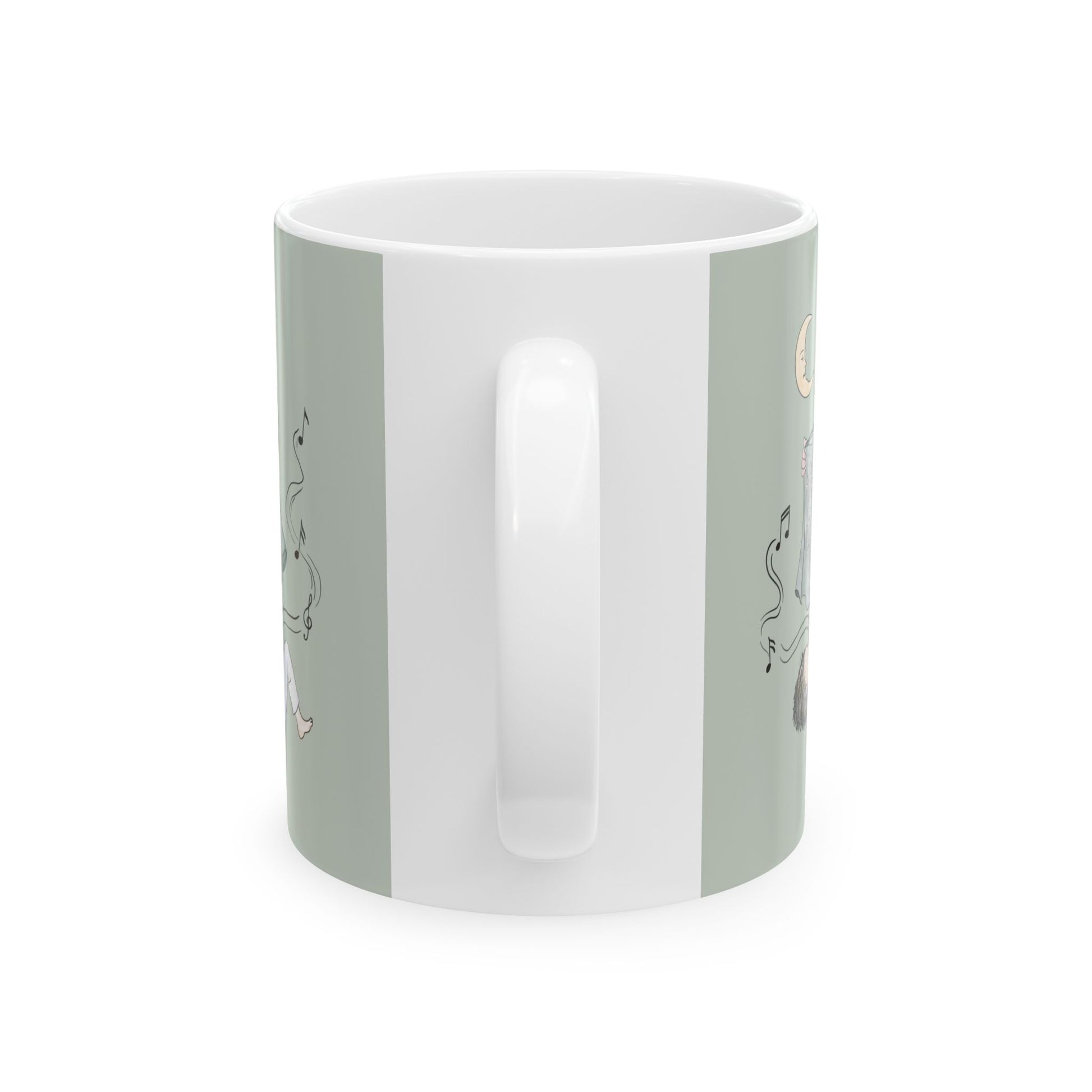 A white ceramic mug with a light sage green side panel featuring minimalist line art illustrations, shown against a plain white background.