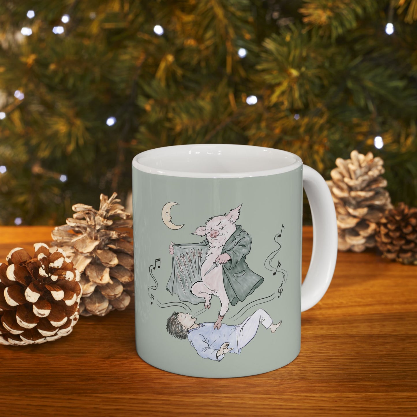 Sage green ceramic mug featuring original hand-drawn Guyute-inspired artwork with a surreal pig, musical mist, moon, and hidden song details.