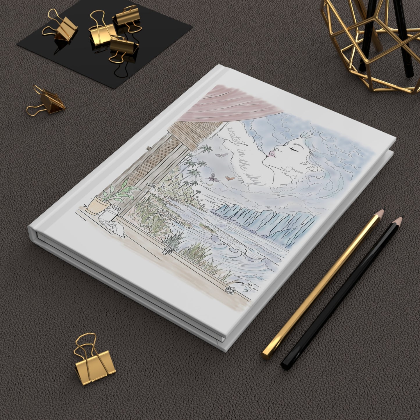 Water in the Sky hardcover journal featuring pastel coastal artwork with ocean waves, tropical palms, butterflies and a woman in the clouds.