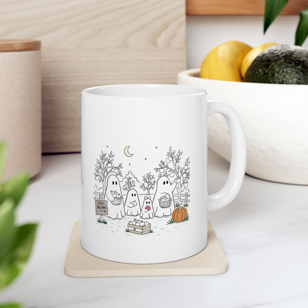 Coffee mug featuring a cute ghost family picking apples in an autumn orchard with baskets, pumpkin, trees and moon from The Story of the Ghost Chapter 4.