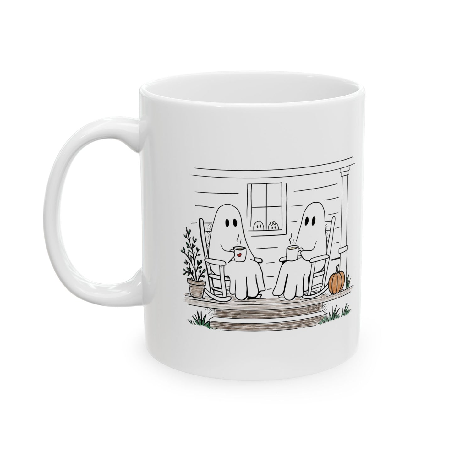 White ceramic mug featuring a hand-drawn ghost family sitting on a front porch in rocking chairs with coffee, with two little ghosts peeking through the window and subtle fall color accents.