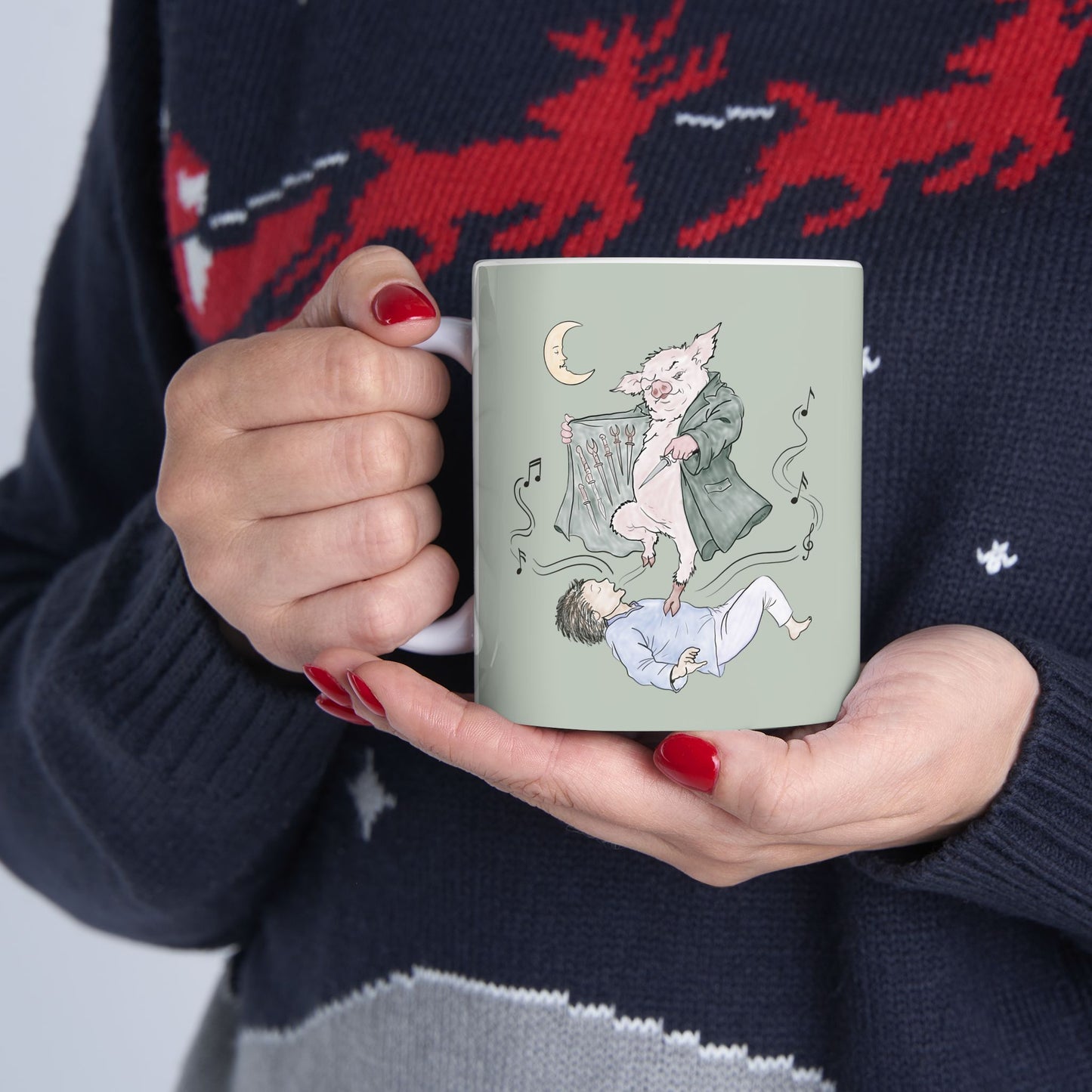 Sage green ceramic mug featuring original hand-drawn Guyute-inspired artwork with a surreal pig, musical mist, moon, and hidden song details.