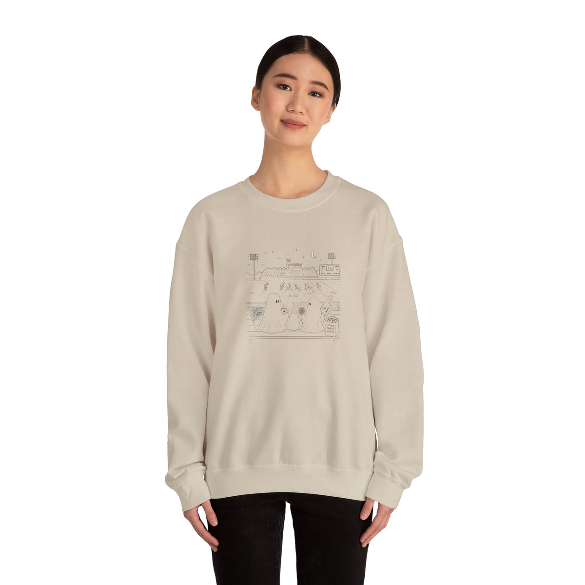 Cream crewneck sweatshirt featuring original cute ghost family football artwork from Friday Night Lights, Chapter 5 of The Story of the Ghost by Market Mafia Creations.