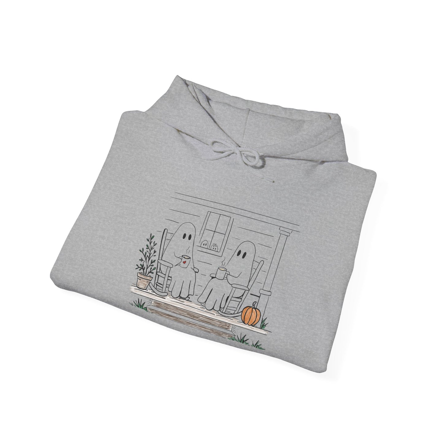 Pullover hoodie featuring a hand-drawn ghost family enjoying coffee in rocking chairs on a front porch, with two little ghosts peeking through the window, a pumpkin, and subtle fall color accents.
