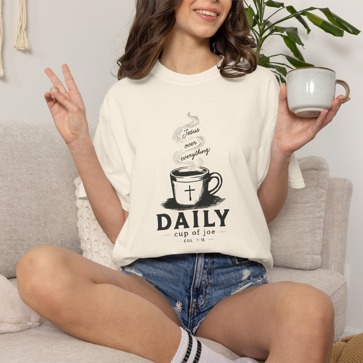 Cream Comfort Colors Christian T-shirt featuring original Daily Cup of JOE Jesus Over Everything coffee cup artwork inspired by Colossians 1:18.