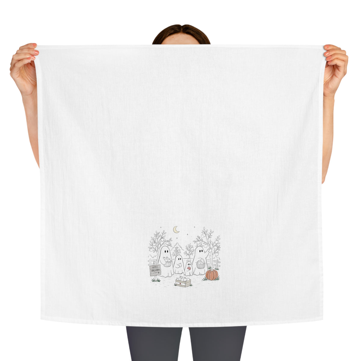 Cotton tea towel featuring a ghost family picking apples in an orchard with trees, baskets, pumpkin and moon from The Story of the Ghost Chapter 4.