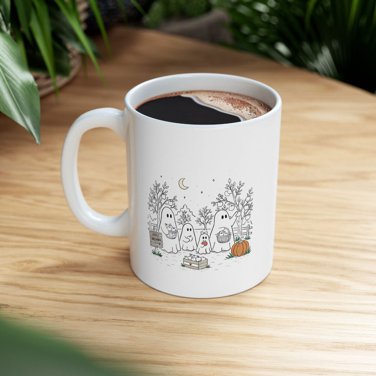 Coffee mug featuring a cute ghost family picking apples in an autumn orchard with baskets, pumpkin, trees and moon from The Story of the Ghost Chapter 4.