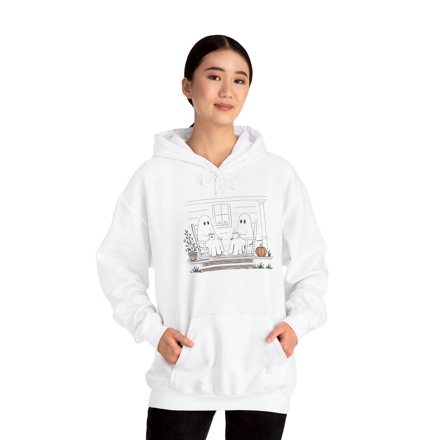 Pullover hoodie featuring a hand-drawn ghost family enjoying coffee in rocking chairs on a front porch, with two little ghosts peeking through the window, a pumpkin, and subtle fall color accents.
