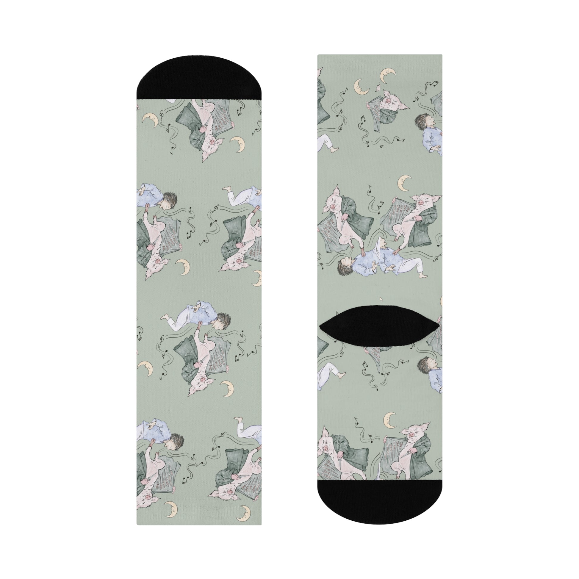 Pair of Guyute-inspired socks featuring original hand-drawn artwork with a surreal pig, moon, musical mist, and muted storybook colors.