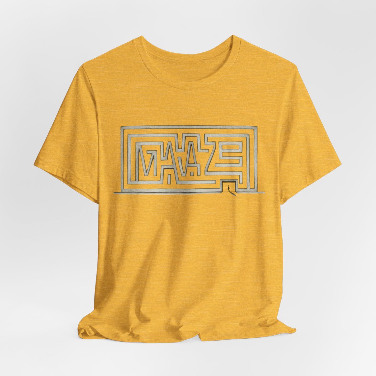 A heathered mustard yellow short-sleeve t-shirt with a gray and blue maze graphic printed on the chest, displayed against a light gray background.