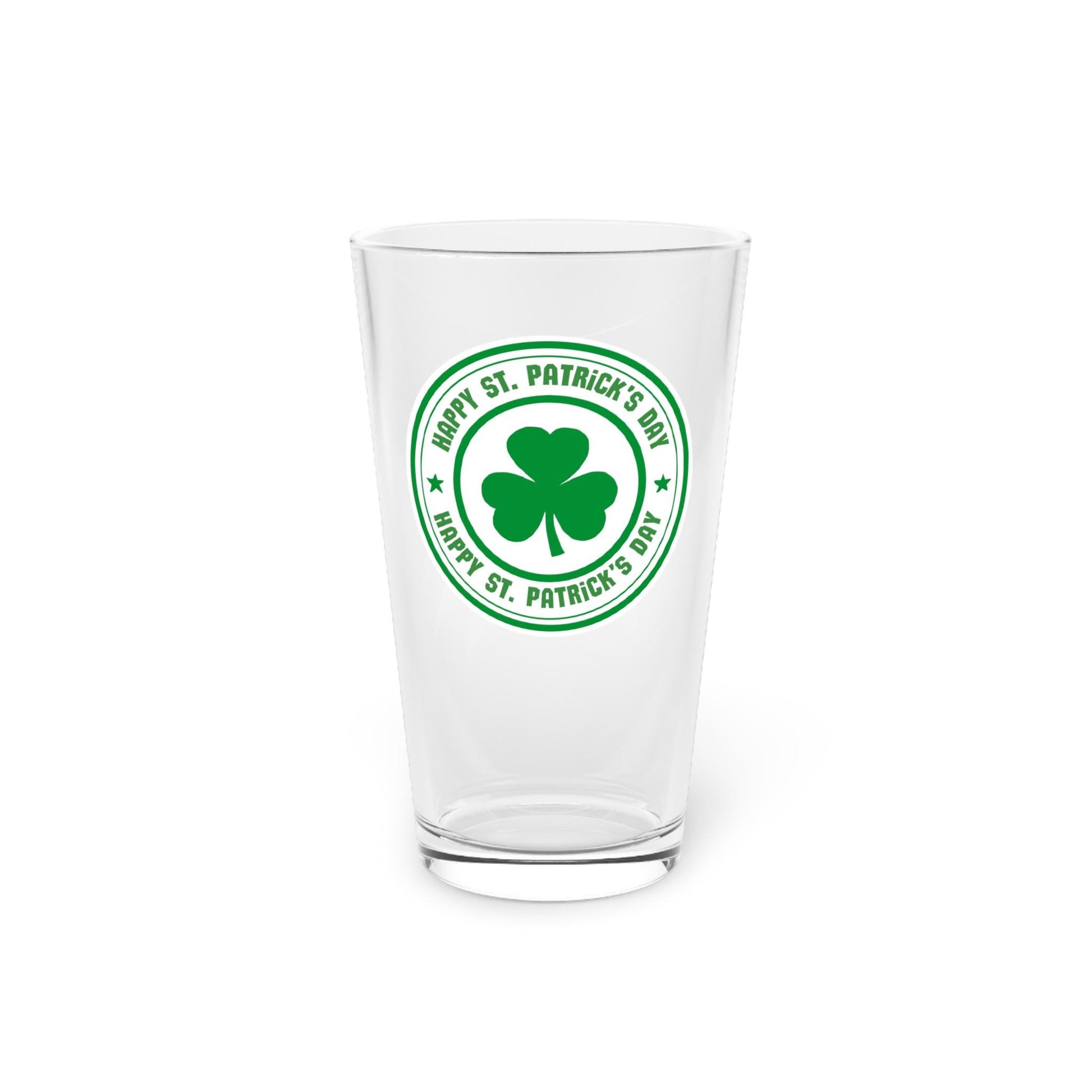 A clear 16oz pint glass with a green shamrock and text design indicating it is for St. Patrick's Day.