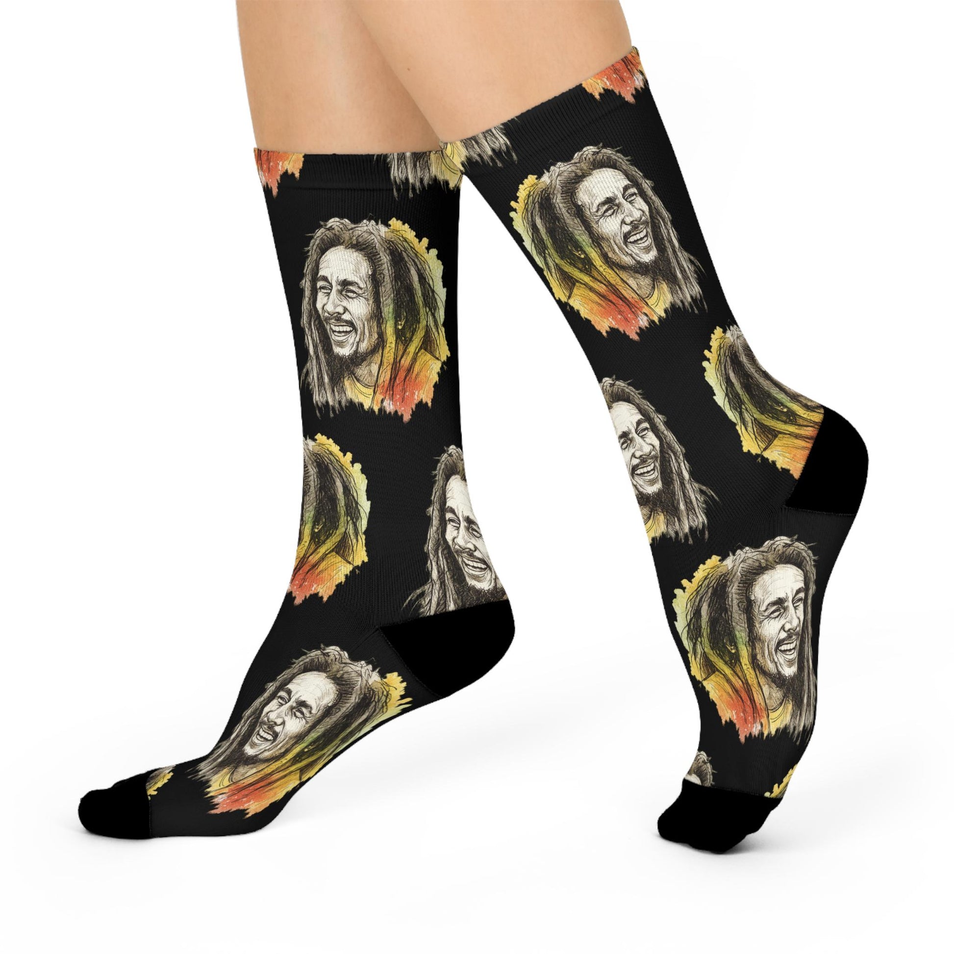 Black socks with colorful graphic of a face on a white background