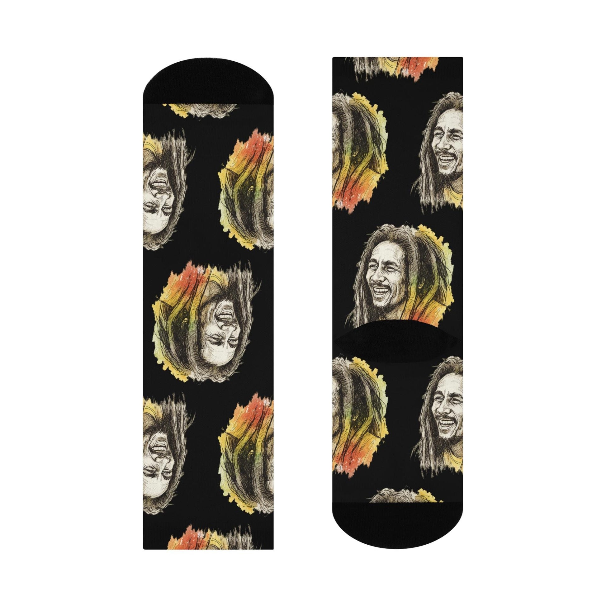 Two socks with a pattern of a smiling face with dreadlocks on a black background.